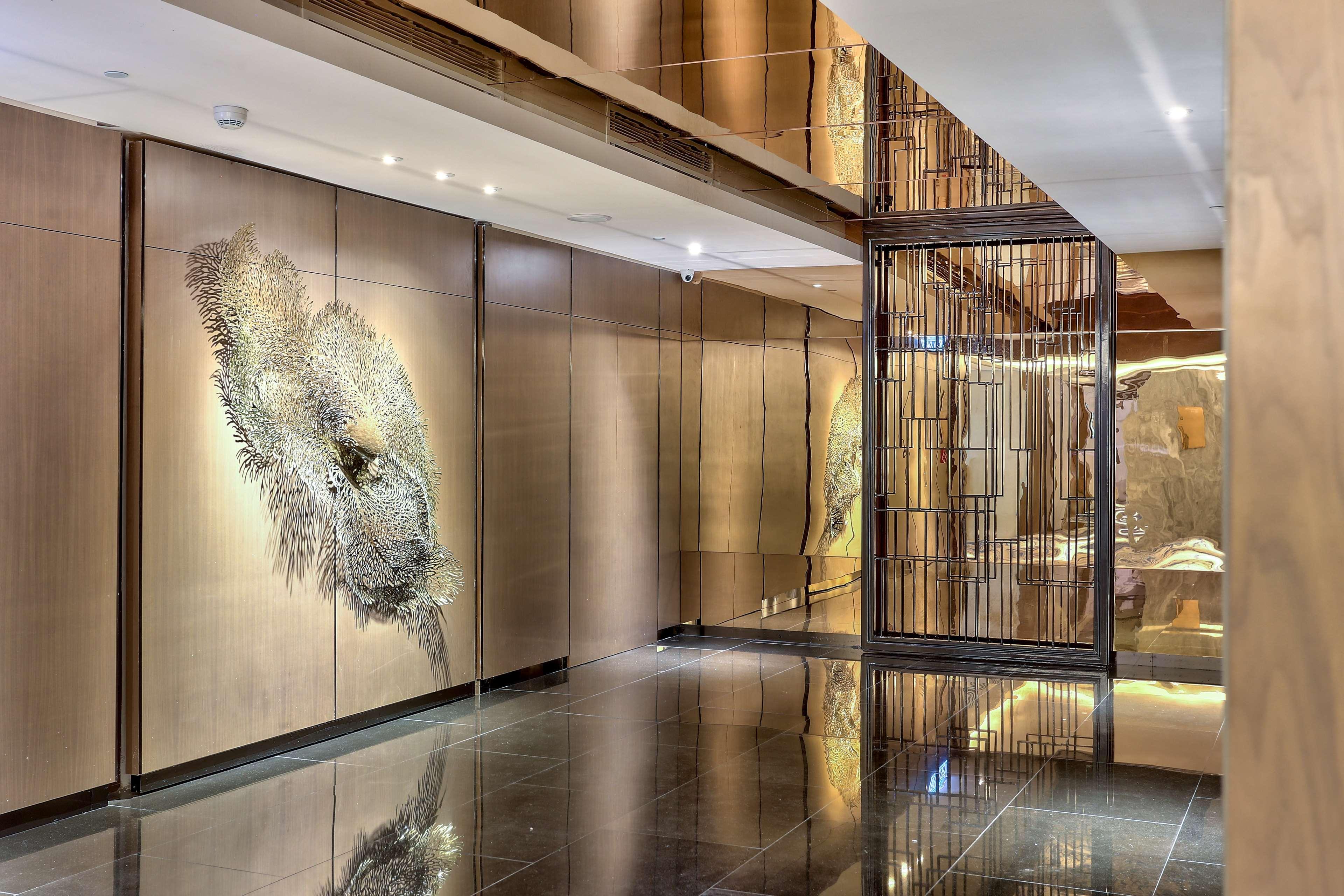 Hilton Kota Kinabalu Hotel Екстериор снимка The lobby of the Ritz-Carlton, DIFC
